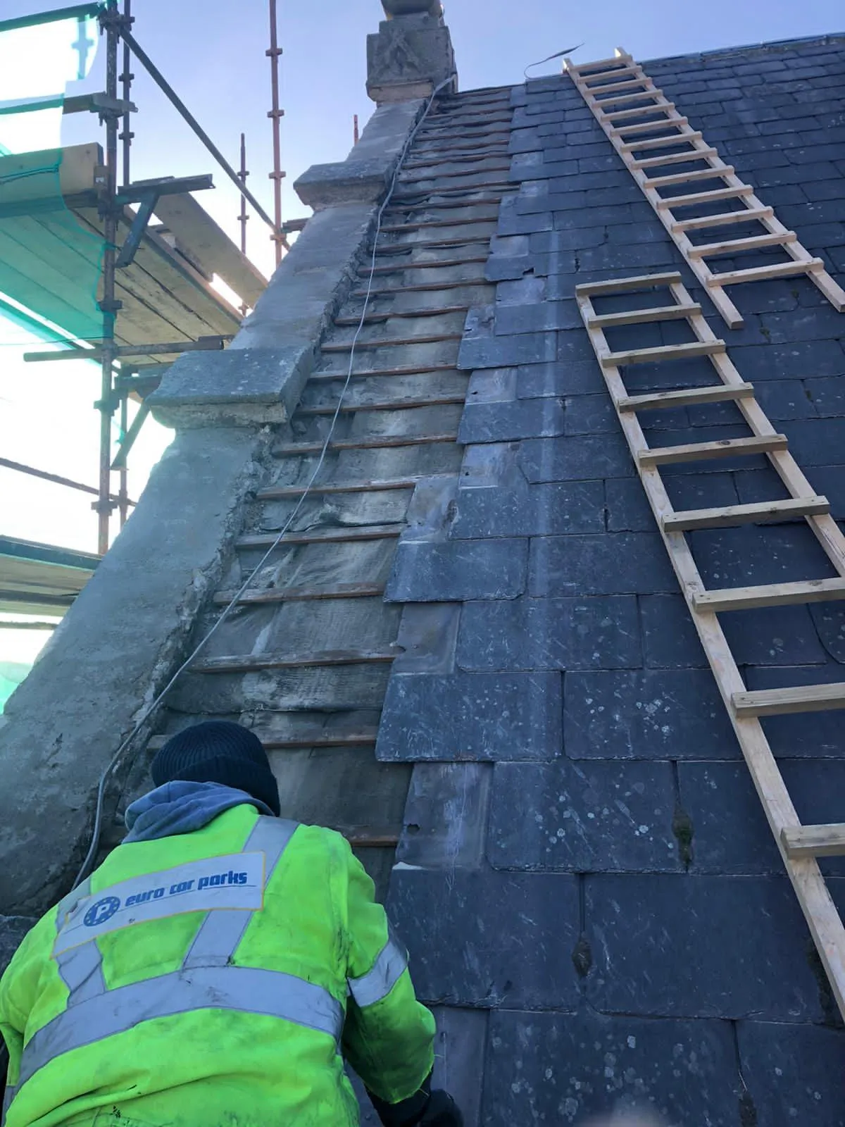 Church roof being repaired — photo 2