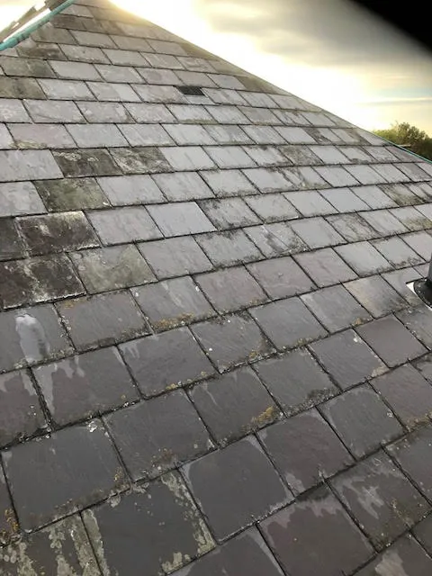 Roof being replaced. Existing Bangor slates on the front and side slopes. New Spanish slates on the back — photo 18