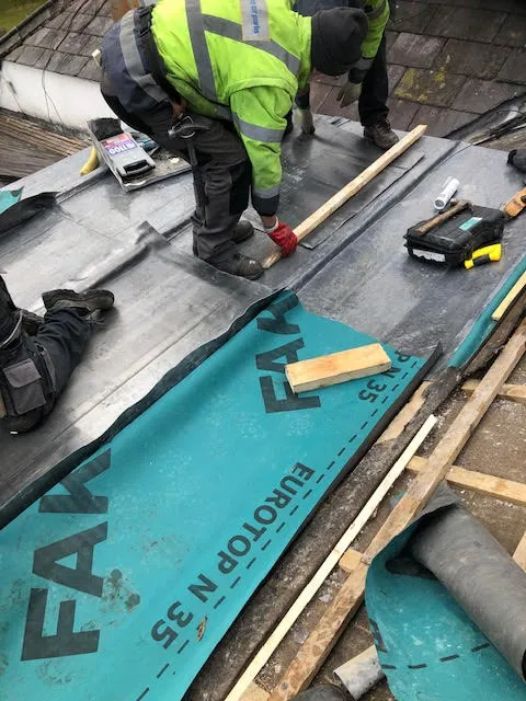 An old lead flat roof and it being replaced — photo 8